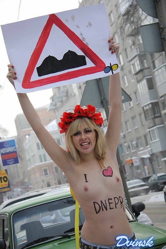 FEMEN ударили топлесом по столице украинских олигархов